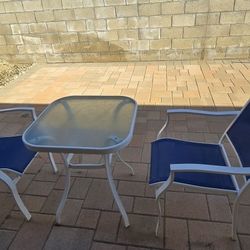 Glass Table With Two Matching Chairs