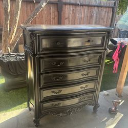 Very nice tall dresser dark brown color