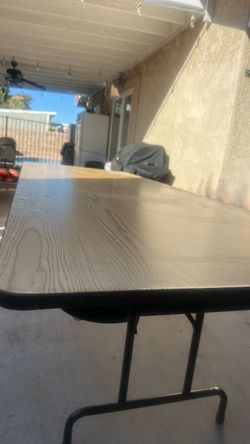 Folding Table with Wood-Grain Top.  8’x3’