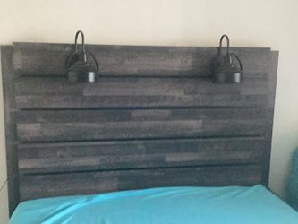 Queen sized bed frame with mattress