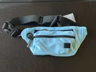 Fanny Pack, Shoulder Bag, Cross Body Bag. Smooth nylon material. New, Never Used. Light blue / baby blue. Porch Pickup.