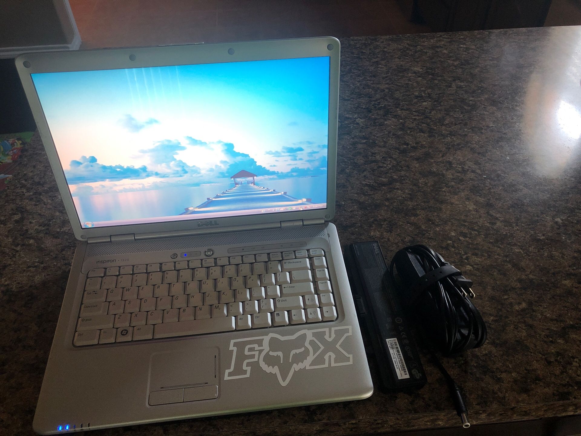 Dell Laptop brand new battery laptop is an Inspiron 1525