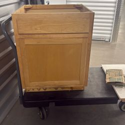 Three Natural Hickory 24-in W x 35-in H x 23.75-in D base cabinet features a traditional partial-overlay raised panel profile for a timeless look tha