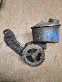 Power Steering Pump With A Reservoir And Mounting Bracket Part Parts