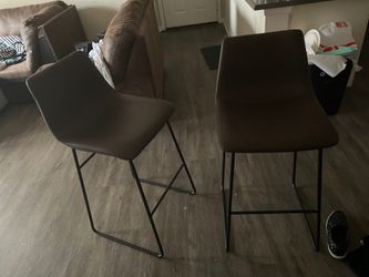 Two Brown Leather Barstools