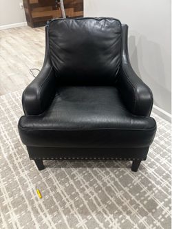 Black leather arm chair