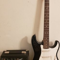 Electric Guitar Starcaster With Amplifier. 
