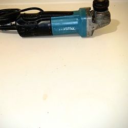 Makita 9557PB  4 1/2 In  Paddle Switch Corded Angle Grinder 