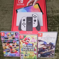 Never used. Brand New. Nintendo Switch Oled With 3 Games. 