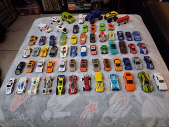 60 Toy Cars/ Carritos $30 Dlls.