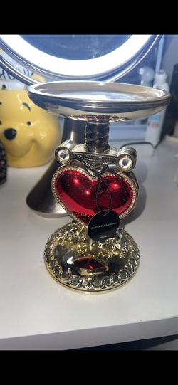 Bath and bodywork candle stand