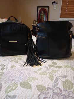 Two new purses 20.00 each one is a back pack nice