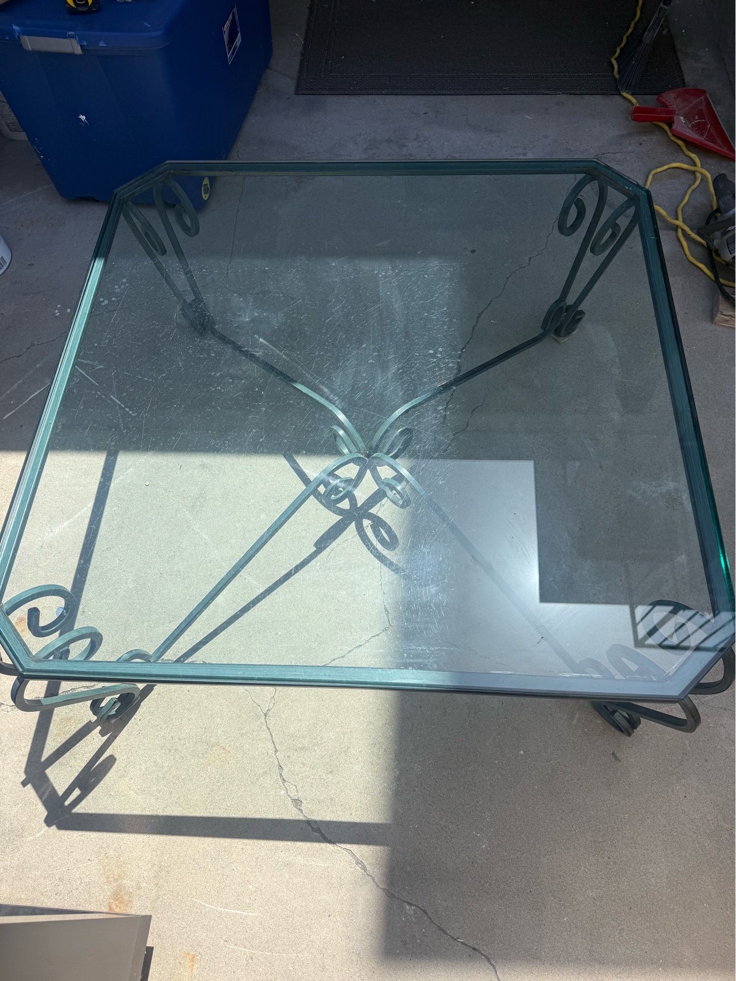 Glass coffee table with metal legs
