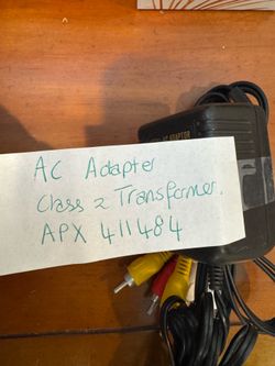 AC-to-AC power adapter (Model APX411484) functioning as a Class 2 transformer