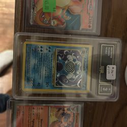 Graded Poliwrath Old School, Charizard Rare Holo