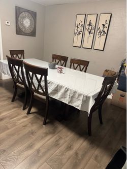 Ashley’s Dark Wood Dining Table with 6 Chairs