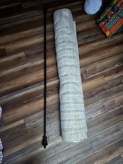 World market wool rug and curtain rod