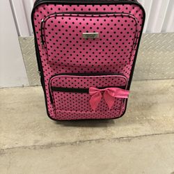 Pink with black polkadots suitcase