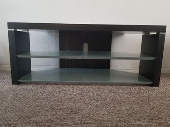 Tv stand with tempered glass shelves