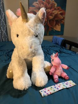 Plush unicorn stuffed animals and head band