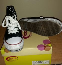 Black converse type shoes