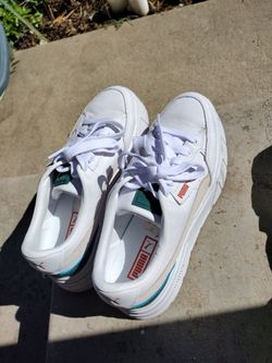 Puma woman size 9 and slip on