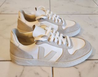 Veja V-10 sneakers in the "White Natural Sahara" or "White Natural Pierre" colorway,