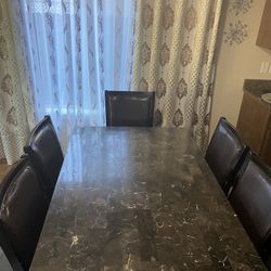 6 person Marble dining table With 6 Chairs Great Condition !!!
