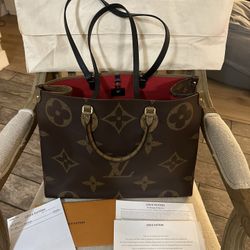 Authentic Louis Vuitton On The Go GM Bag