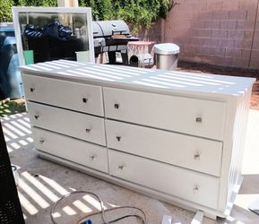 White six drawer dresser with mirror