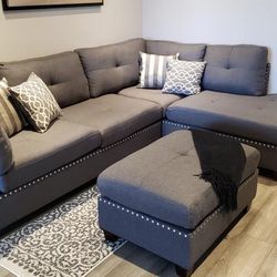 grey linen Sectional Sofa with ottoman and 2 accent pillows