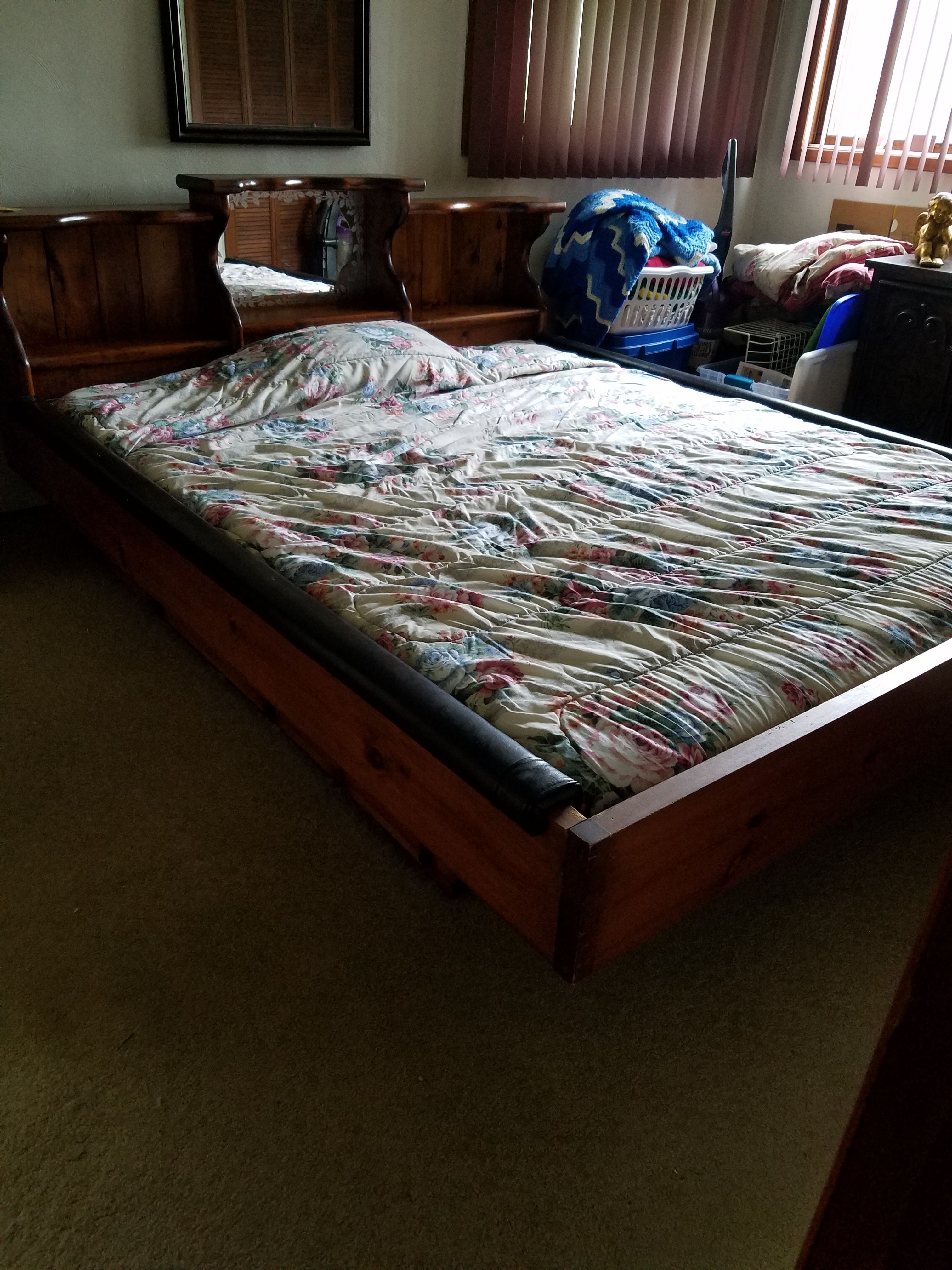 King waterbed frame with a king size regular insert mattress. It sets on a 6 drawer pedestal. Must be picked up by end of March.