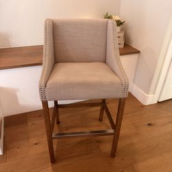 Tall upholstered chair