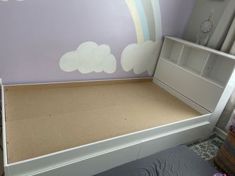 Twin particle board bed frame with 2 small shelves