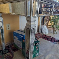 Mirrored Table and Upholstered Arm Chair