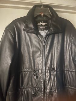 Genuine black leather Maxima jacket from Wilsons Leather. This size XL garment has a full-zip front closure, a drawstring waist with toggles, and two 