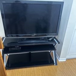 Tv Stand + Tv Set