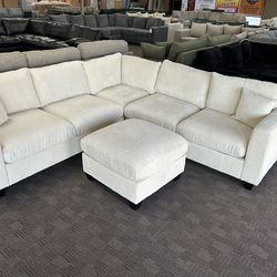 Stunning cream sectional w/ ottoman