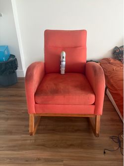 FREE Orange Upholstered Rocking Chair + Woolite Cleaner