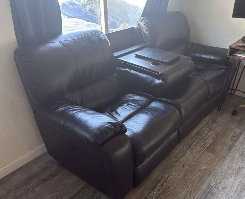 Black Leather Dual Power Reclining Sofa
