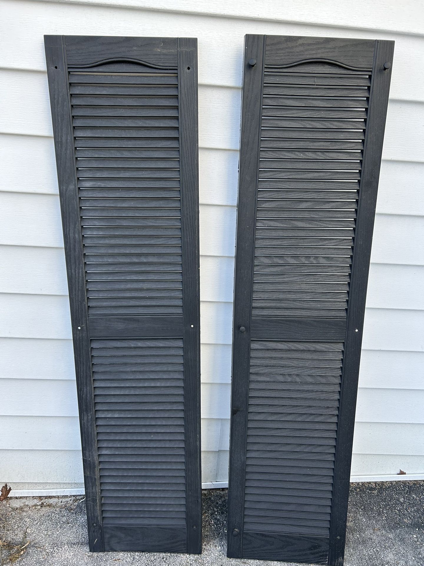 Black 14.5 X 60 In. Louvered vinyl Exterior Shutters ($10 Each)