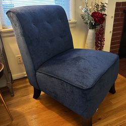 Tufted blue velvet chair