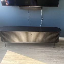 Large roller cabinet style black entertainment center