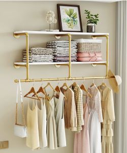 Brand new industrial pipe wall clothes rack (gold with white shelf) (small damage on corners)