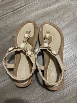 Brand new women’s sandals 9M