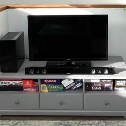 Gray IKEA TV stand with storage