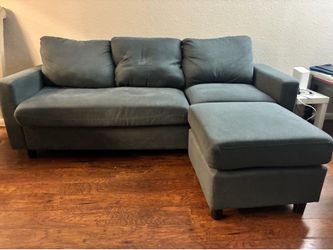 Gray couch with ottoman