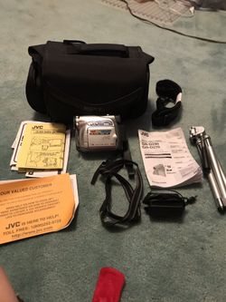 New JVC Camcorder with case, tripod, charger and paperwork. New - never used