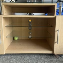 TV Stand With Glass Top And Cabinets. 