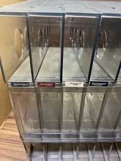 chewing tobacco display rack DISPLAY RACK for chewing tobacco. Holds normal cans of snuff and any other  kind of rolling cans of tobacco. 24 slots, each slot holds 10 cans. 240 tot  for Sale in Weatherford, TX
